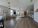 Expansive living area with stylish furniture, a large TV, and ample natural light at 3567 74Th Avenue E Cir, Sarasota, FL 34243