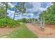 A community playground featuring fun climbing structures for children to explore and enjoy outdoor play at 12990 Burns Dr, Odessa, FL 33556