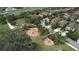 Aerial view of the neighborhood playground showcasing the Gathering friendly area for children to enjoy with lush surroundings at 12990 Burns Dr, Odessa, FL 33556