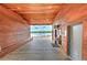 Community restrooms with wooden ceilings and exterior walls, offering a view of the lake at 12990 Burns Dr, Odessa, FL 33556