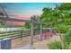 Charming swing set near the lake, offering a relaxing spot with scenic views at 12990 Burns Dr, Odessa, FL 33556