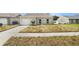 Charming single-story home with a well-maintained lawn and inviting curb appeal at 4506 Shadberry Dr, Tampa, FL 33624