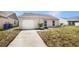 Charming single-story home with a well-maintained lawn and inviting curb appeal at 4506 Shadberry Dr, Tampa, FL 33624