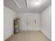 Spacious garage area with water heater at 4506 Shadberry Dr, Tampa, FL 33624