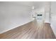 Bright, open-plan living area featuring wood-look floors and abundant natural light at 4506 Shadberry Dr, Tampa, FL 33624