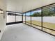 Screened-in patio perfect for enjoying the outdoors while avoiding insects at 4506 Shadberry Dr, Tampa, FL 33624