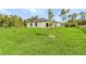 Well-manicured backyard with plush lawn at 4798 Jody Ave, North Port, FL 34288