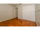Bedroom with a closet and unique orange tiled floors at 3703 43Rd W Ave, Bradenton, FL 34205