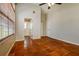 Bedroom with a ceiling fan, tile flooring, and bright window looking into greenery at 3703 43Rd W Ave, Bradenton, FL 34205