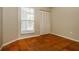 Bedroom with a window and closet with bi-fold doors at 3703 43Rd W Ave, Bradenton, FL 34205