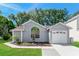 Charming single-story home features a manicured lawn and attached one-car garage at 3703 43Rd W Ave, Bradenton, FL 34205