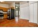 Bright kitchen with stainless steel appliances and access to the living room at 3703 43Rd W Ave, Bradenton, FL 34205