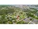 Aerial view showcases the property's location in a serene, wooded neighborhood at 7635 Pier Rd, Port Richey, FL 34668