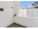 A bright, compact laundry room with connections and a view at 7635 Pier Rd, Port Richey, FL 34668