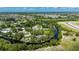Aerial view of the property, surrounded by water, and showing the layout of the land at 5700 Oakview Ln, Punta Gorda, FL 33950