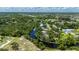 Aerial view of the property, surrounded by water, and showing the layout of the land at 5700 Oakview Ln, Punta Gorda, FL 33950
