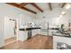 Clean kitchen with white cabinets, stainless appliances, and granite countertops at 5700 Oakview Ln, Punta Gorda, FL 33950