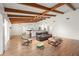 Comfortable living room featuring beamed ceilings and an open layout at 5700 Oakview Ln, Punta Gorda, FL 33950