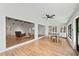 Spacious living room with an open floor plan and hardwood floors, perfect for entertaining and relaxation at 5700 Oakview Ln, Punta Gorda, FL 33950