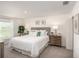 Bright bedroom featuring a large window and neutral color scheme at 14037 Canada Goose Rd, Brooksville, FL 34614