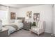 Cozy bedroom featuring a bed, armchair, and soft color palette at 14037 Canada Goose Rd, Brooksville, FL 34614