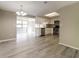 Spacious kitchen and dining area with stainless steel appliances and plenty of natural light at 8744 Candlewick Ln, Port Richey, FL 34668