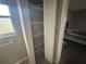 Bedroom closet with adjustable shelving for efficient storage at 131 49Th E Ct, Palmetto, FL 34221
