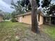 Exterior of home featuring lawn and covered outdoor space at 131 49Th E Ct, Palmetto, FL 34221