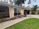 Side angle showing the home's exterior, garage, and lawn at 131 49Th E Ct, Palmetto, FL 34221