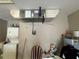 Laundry area with stacked washer and dryer, next to HVAC equipment at 131 49Th E Ct, Palmetto, FL 34221