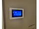 Wall mounted security system touchscreen with multiple options displayed at 131 49Th E Ct, Palmetto, FL 34221