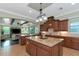 Open kitchen concept featuring granite countertops and seamless flow into living area at 7315 Bianco Duck Ct, Sarasota, FL 34240