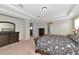 Spacious main bedroom with a tray ceiling, carpeted floors, and neutral color scheme at 7315 Bianco Duck Ct, Sarasota, FL 34240