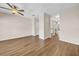 Bright, open living space featuring hardwood floors and neutral walls at 5857 Fishhawk Ridge Dr, Lithia, FL 33547