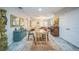 The living room has hardwood floors, a dining area, and ample space for both dining and entertaining at 3610 N Tampa St, Tampa, FL 33603