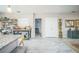 Versatile living area with tile flooring, offering ample space for various activities and storage at 3610 N Tampa St, Tampa, FL 33603