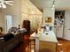 Kitchen with breakfast bar and view into the living room at 4147 Kingsfield Dr, Parrish, FL 34219