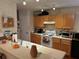 Kitchen with wood cabinets and modern appliances at 4147 Kingsfield Dr, Parrish, FL 34219