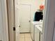 Convenient laundry room with washer, dryer, and storage at 4147 Kingsfield Dr, Parrish, FL 34219