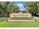 Beautifully landscaped entrance to the Hampton On The Green neighborhood at 8749 Ashworth Dr, Tampa, FL 33647