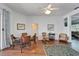 Bright dining area with wood floors, wicker furniture, and an airy, welcoming atmosphere at 8749 Ashworth Dr, Tampa, FL 33647