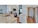 A modern kitchen with granite countertops, stainless steel appliances, and ample cabinet space at 8749 Ashworth Dr, Tampa, FL 33647