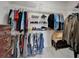 Large walk-in closet with shelving and plenty of room for storage at 8749 Ashworth Dr, Tampa, FL 33647