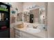 Clean bathroom with single sink and walk-in shower at 10038 62Nd N Ter # 2, St Petersburg, FL 33708