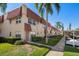 Exterior view of building with landscaping and parking at 10038 62Nd N Ter # 2, St Petersburg, FL 33708