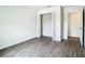 Bedroom with wood-look flooring and double-door closet at 12128 Grouse Ave, Port Charlotte, FL 33981