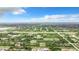 Aerial view showing a large neighborhood with new homes at 12128 Grouse Ave, Port Charlotte, FL 33981