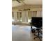 Spacious living room with large windows and ample natural light at 6480 Center Lane, North Port, FL 34287