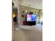 Relaxing living room with a large TV and plenty of space at 6480 Center Lane, North Port, FL 34287