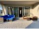 Covered patio with wicker furniture and a view of the house at 3101 Hollow Hickory Pl, Wesley Chapel, FL 33543
